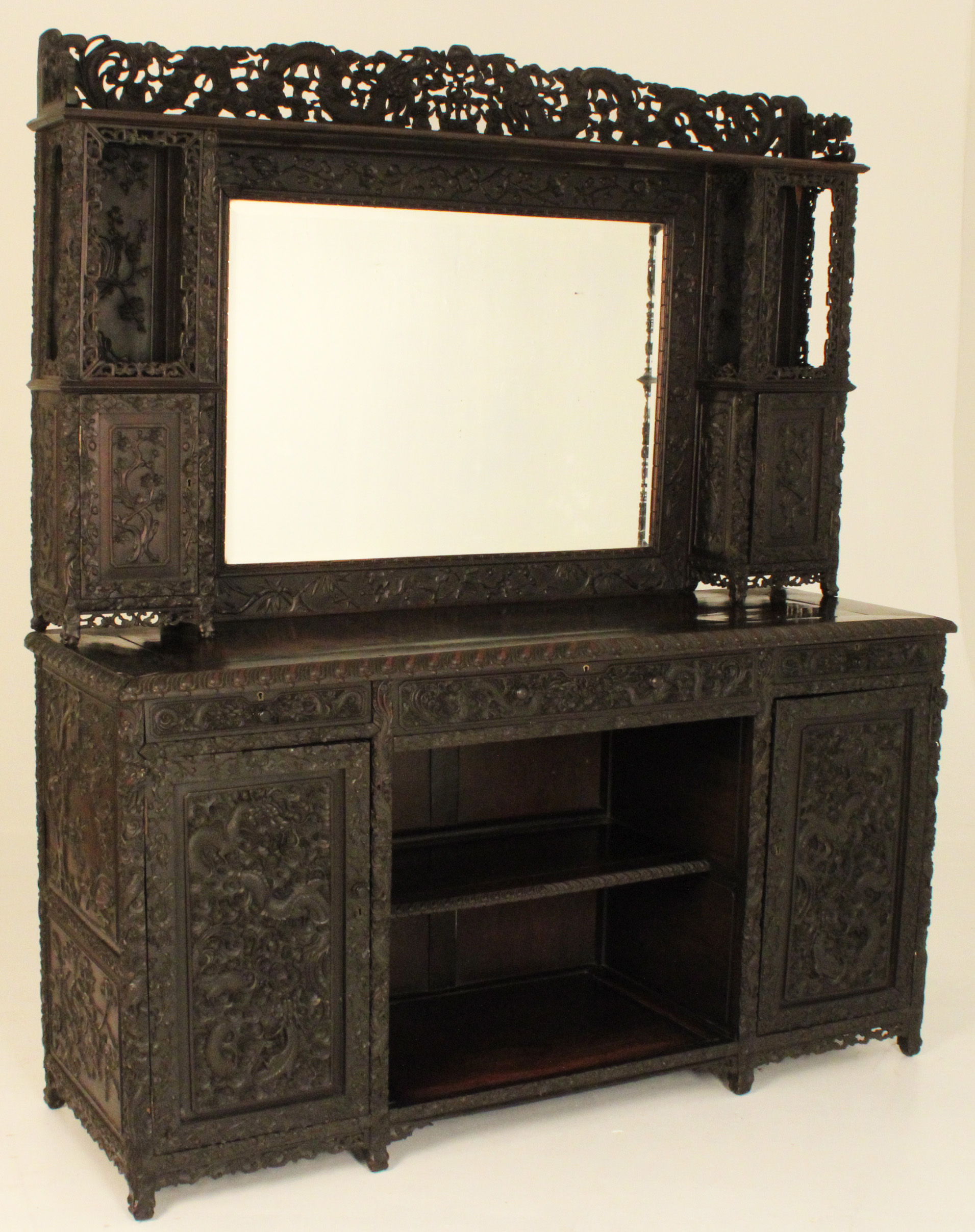 HEAVILY CARVED CHINESE TEAKWOOD