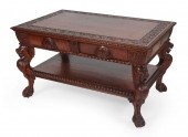 HEAVILY CARVED LIBRARY TABLE E