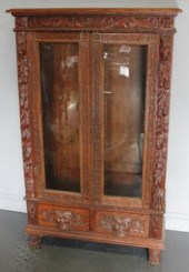 Heavily Carved Oak Bookcase wi