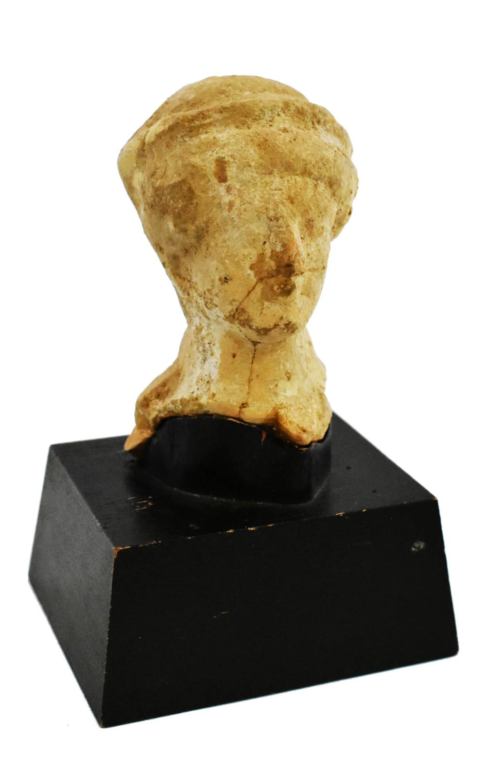 HELLENISTIC TERRA COTTA HEAD OF A