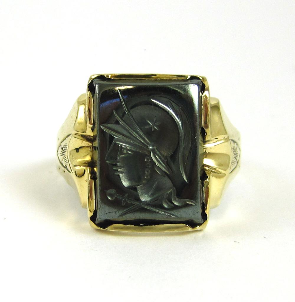 HEMATITE AND TEN KARAT GOLD RING.