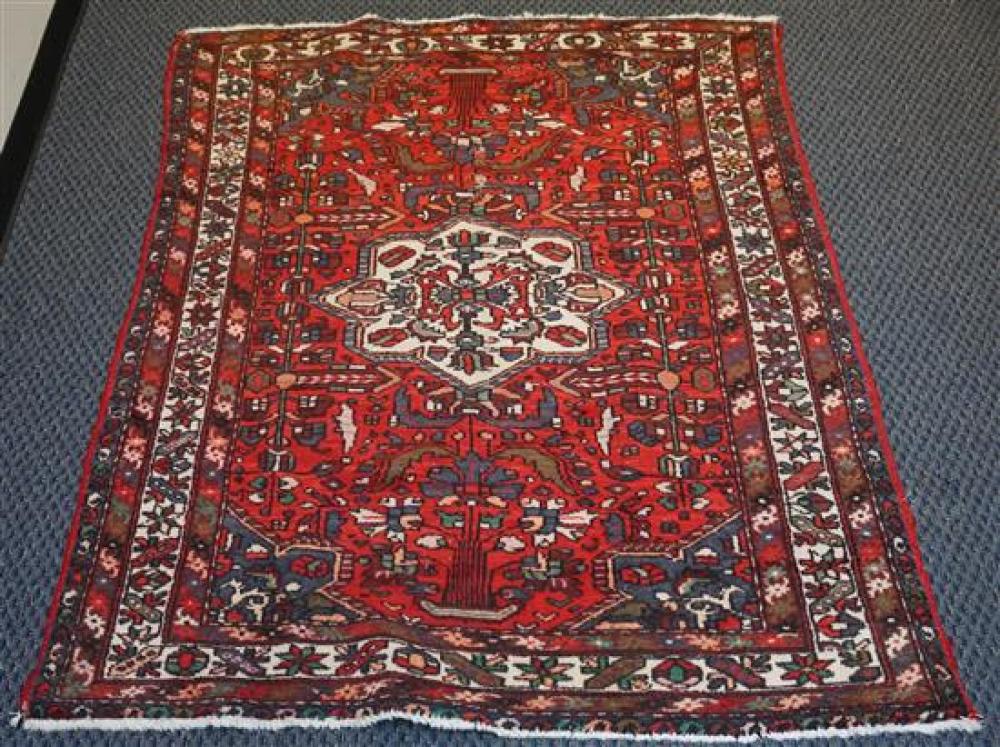 HERIZ RUG , 6 FT 9 IN X 5 FT