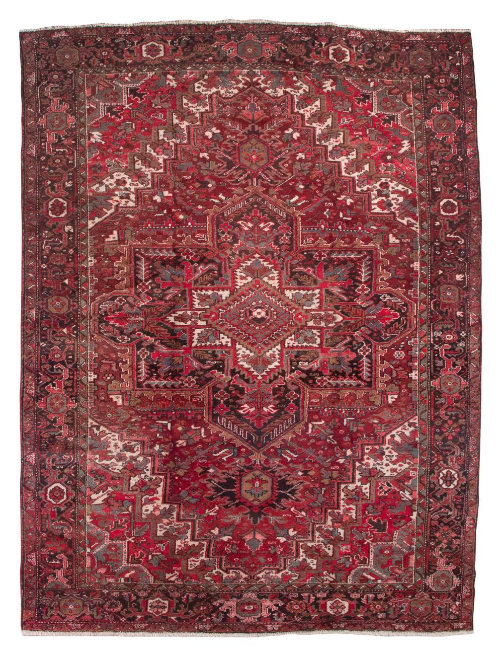 HERIZ RUG: 9’8” X 12’10” THIRD