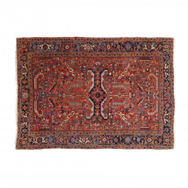 HERIZ RUG Reddish orange field with