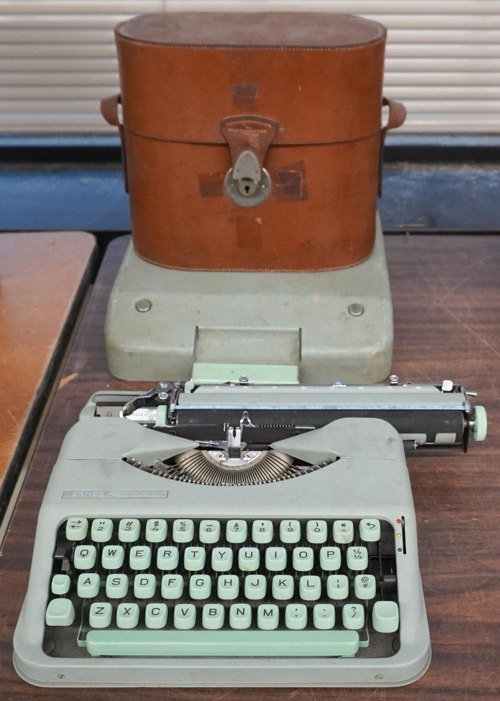 HERMES ROCKET TYPEWRITER AND A