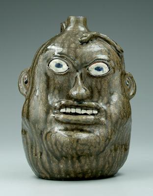 Hewell face jug, snake across