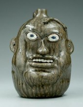 Hewell face jug, snake across
