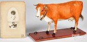 HIDE COVERED COW ON WHEELED PL