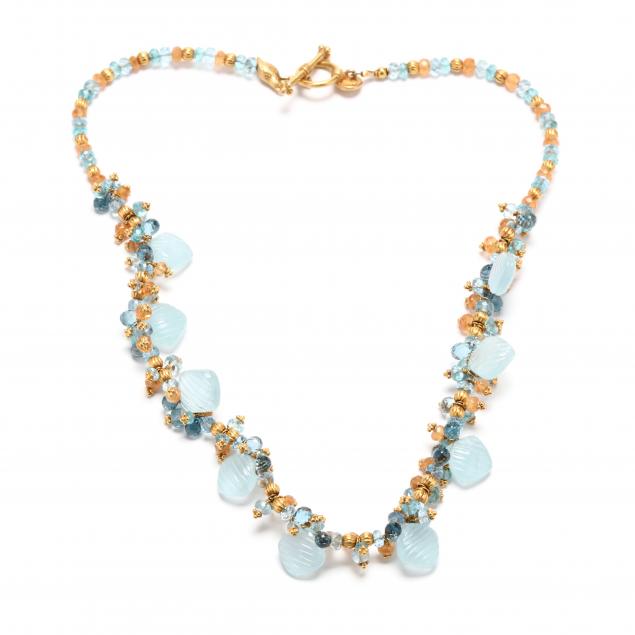 HIGH KARAT GOLD AND GEM-SET BEAD