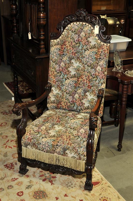 HIGHBACK ARMCHAIR. Oak chair having
