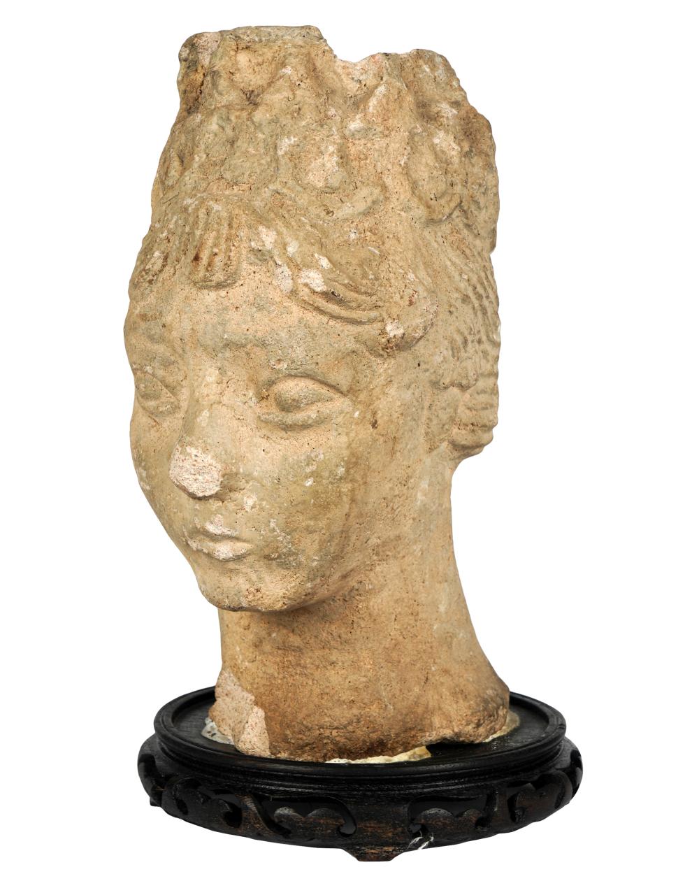 HITTITE CARVED STONE HEADon a