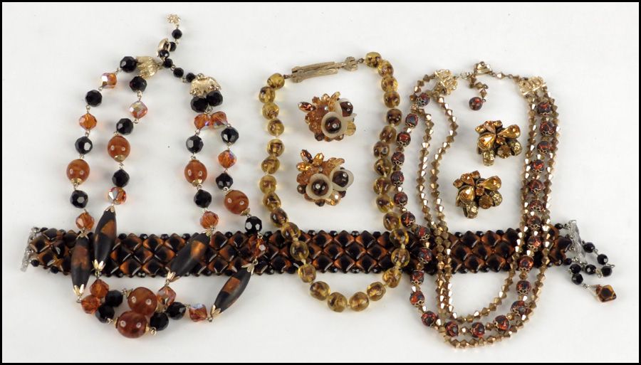 HOBE TRIPLE-STRAND BEAD NECKLACE.