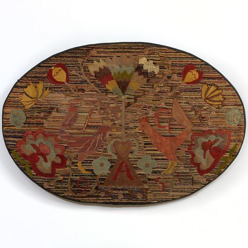 HOOKED OVAL &#039;IGA&#039; RUG,
