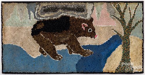 HOOKED RUG OF A BEARHooked rug of a