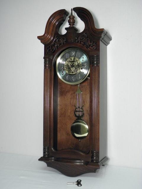 Howard Miller Mahogany cased wall