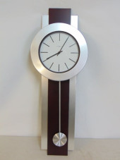 HOWARD MILLER WALL CLOCK, IN B