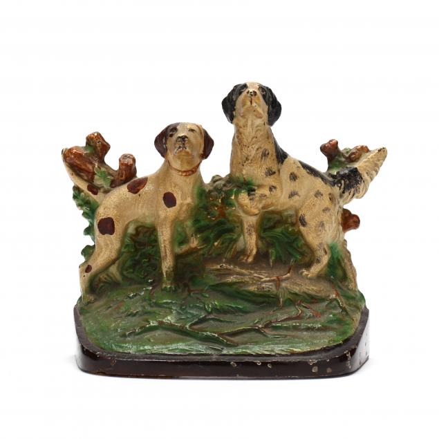 HUBLEY, CAST IRON DOORSTOP OF TWO