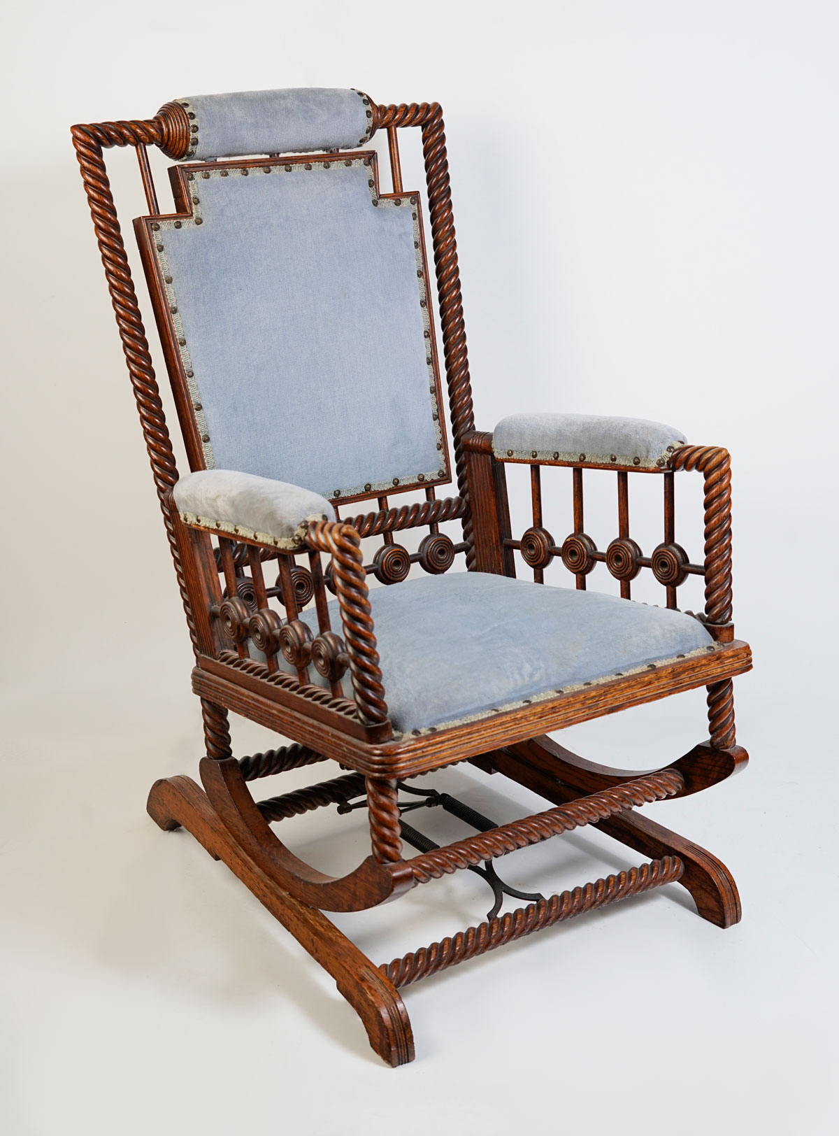 HUNZINGER CARVED OAK ROCKING CHAIR: