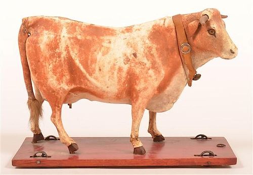 HYDE COVERED COW PULL TOY.Hyde