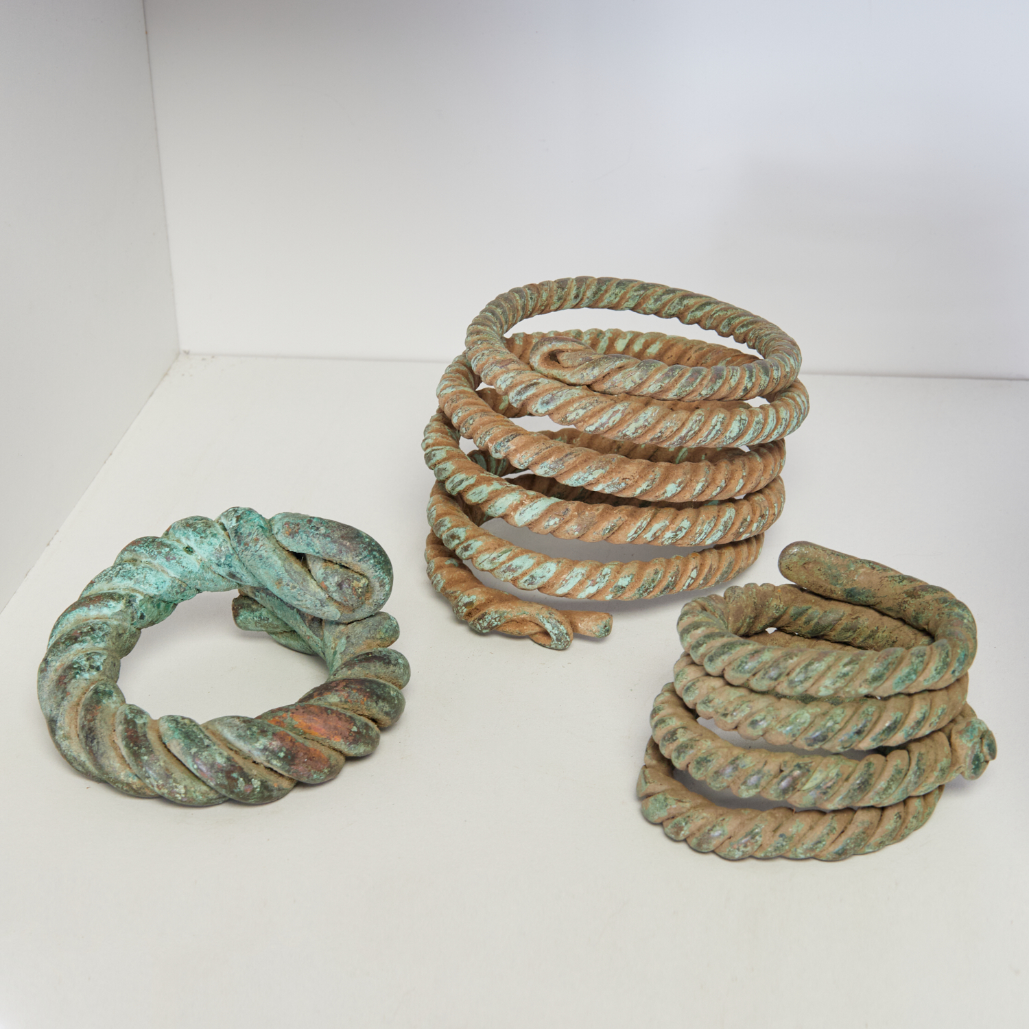 IGBO PEOPLES, (3) TWISTED MANILLA