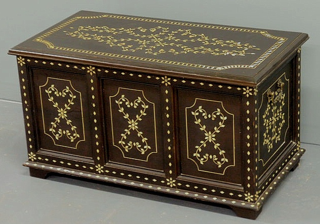 Inlaid ebony blanket chest with a