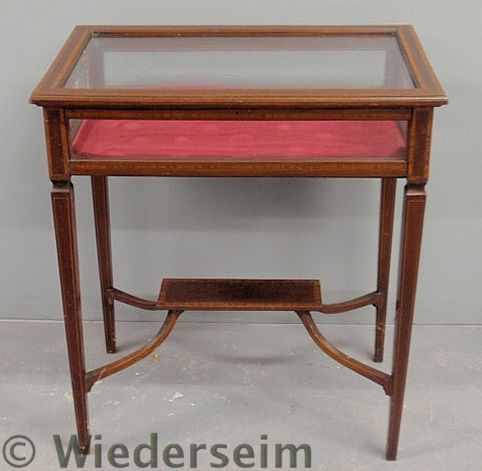 Inlaid mahogany curio table with