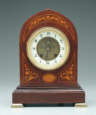 Inlaid mahogany key wind shelf