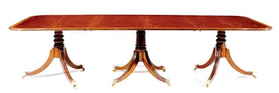 Inlaid mahogany triple-pedestal