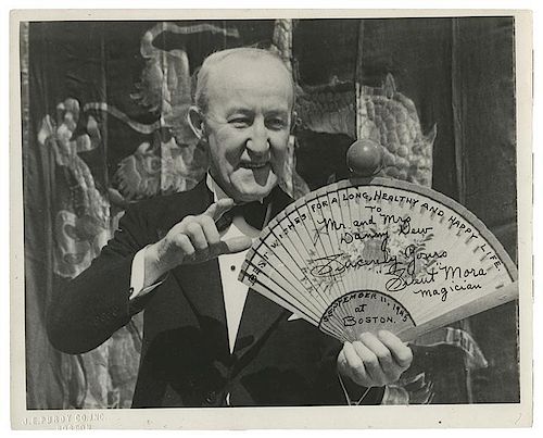 INSCRIBED AND SIGNED PORTRAIT OF