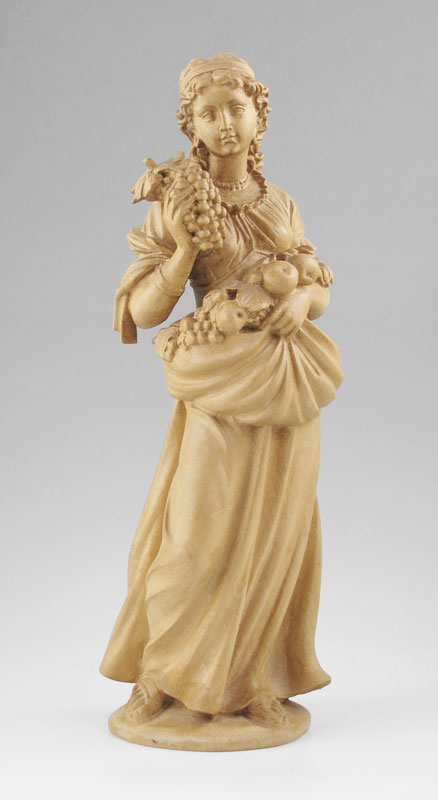 INTRICATELY CARVED WOODEN SCULPTURE
