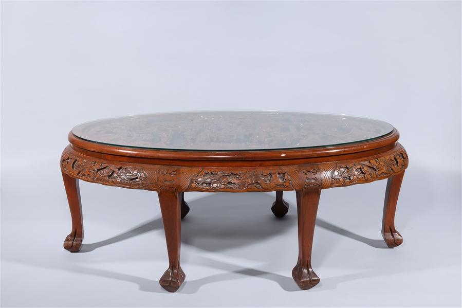 Intricately carved wooden table