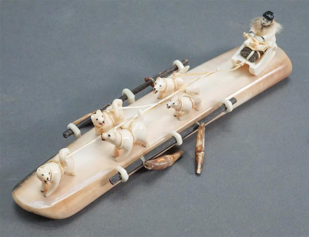 INUIT CARVED FIGURE OF A DOG SLED