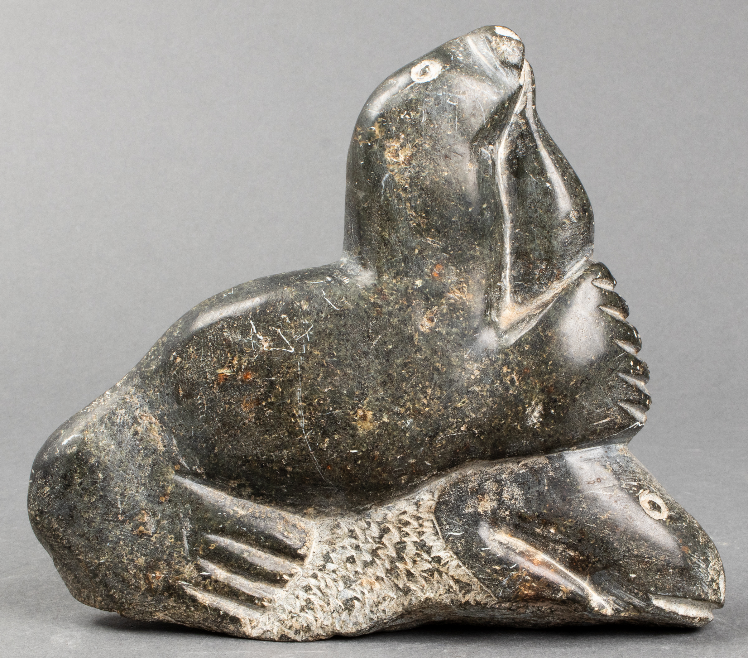 INUIT CARVED HARDSTONE SCULPTURE OF