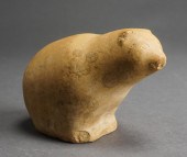 INUIT CARVED STONE FIGURE OF A