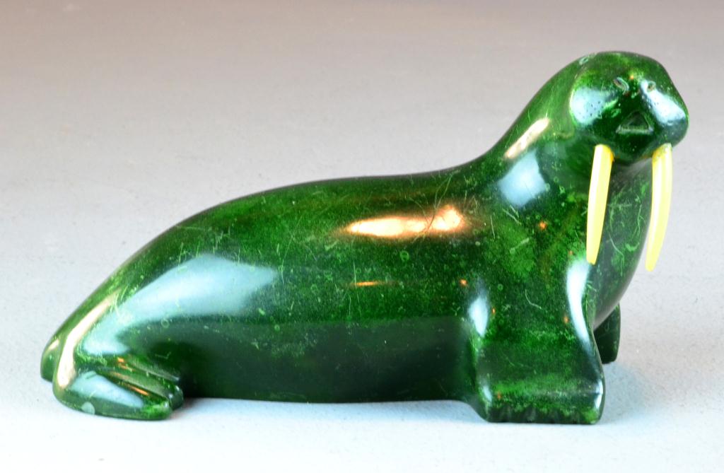 Inuit Stone Carving Depicting A