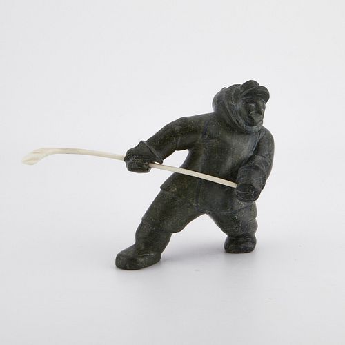 INUIT STONE HOCKEY CARVINGInuit