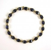 IOLITE AND TEN KARAT GOLD BRAC