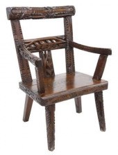 IRISH PRIMITIVE CARVED OAK ARM
