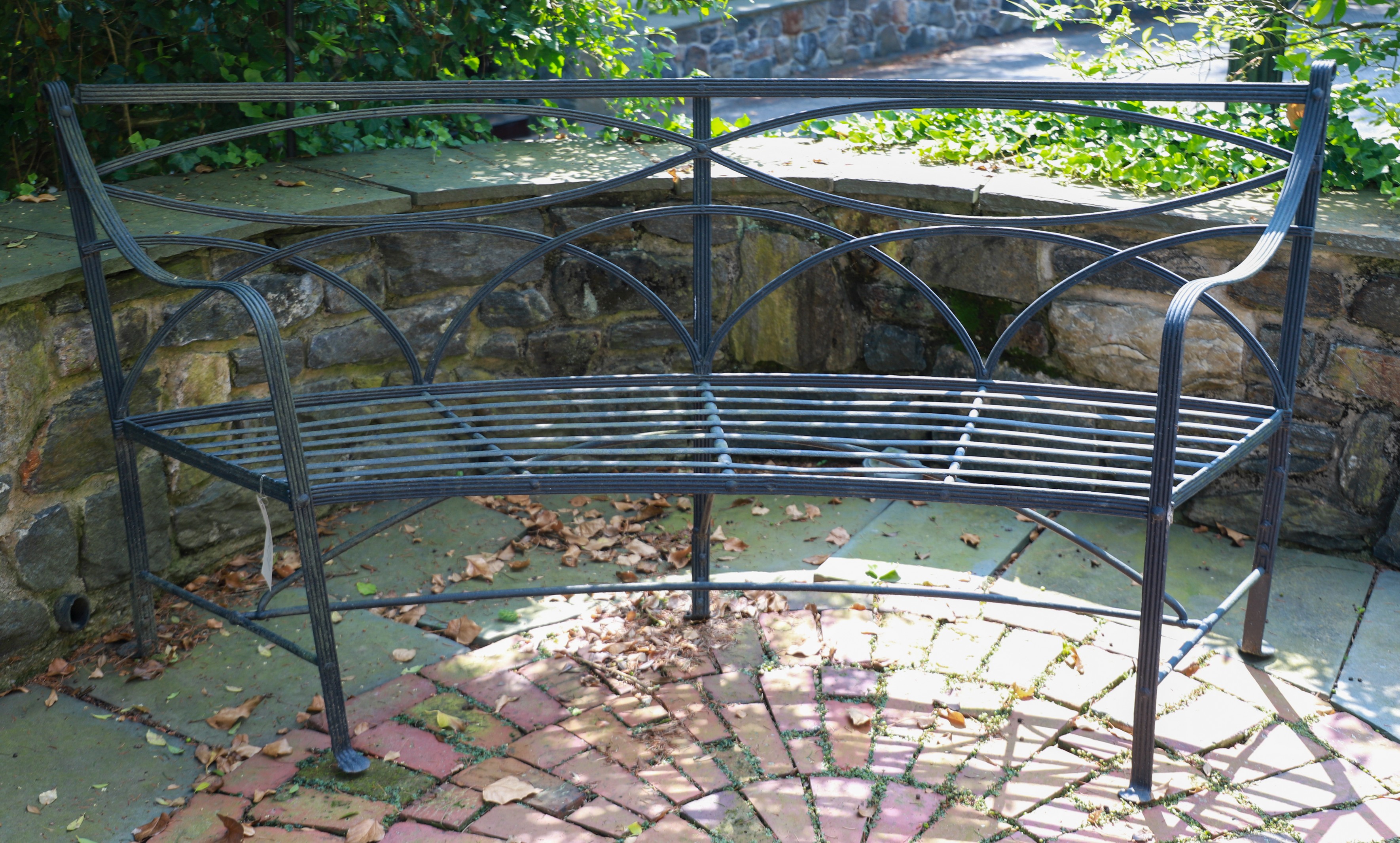 Iron and white metal bowfront