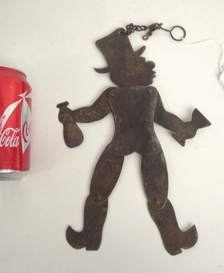 Iron articulating figure of a