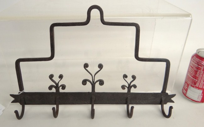 Iron hook rack. 15'' W 9 1/2'' Ht.