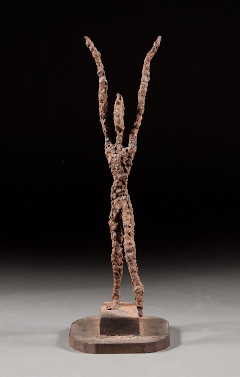 Iron sculpture of walking man