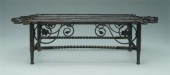 Iron trivet, spiral and floral