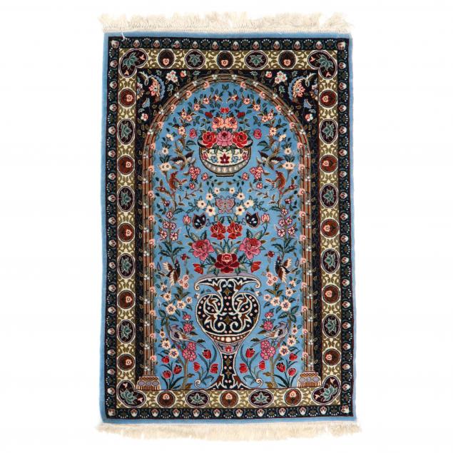 ISFAHAN AREA RUG In a tree of
