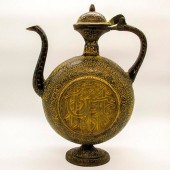 ISLAMIC BRASS WINE EWERAn Isla