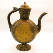 ISLAMIC BRASS WINE EWERAn Isla