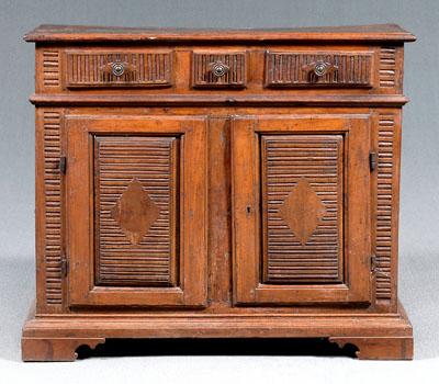 Italian Baroque walnut cabinet,