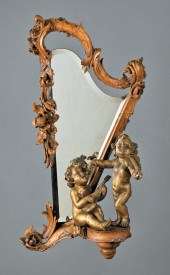 ITALIAN CARVED AND GILT WALNUT