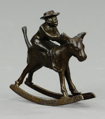 IVES MAN RIDING DONKEY ROCKER