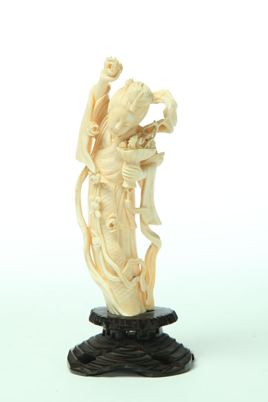 IVORY CARVING OF A WOMAN.  China 
